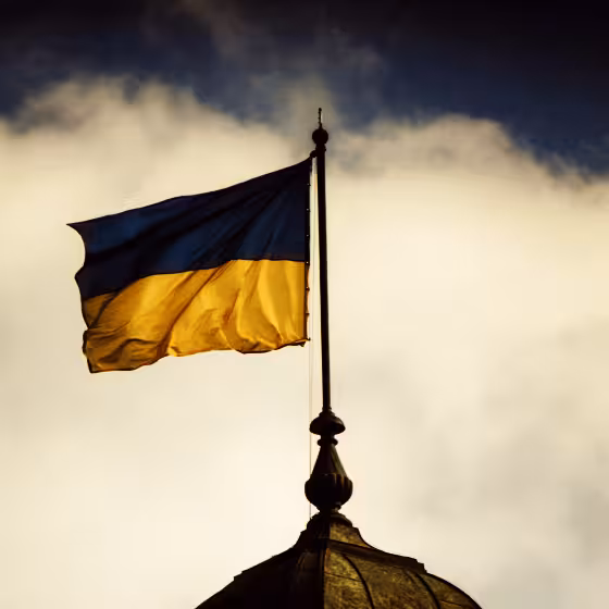 the national flag of ukraine flying in lviv is a symbol of resistance and resilience
