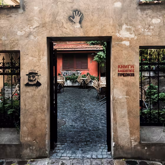 secluded entrance to a wine bar in the armenian quarter of lviv