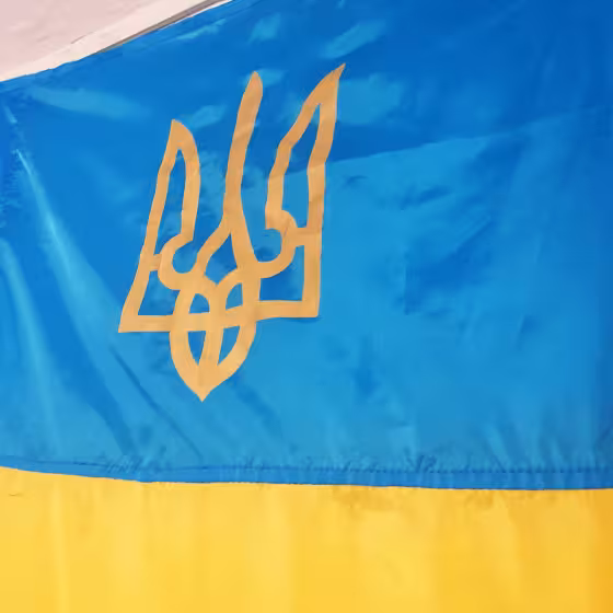 flag of ukraine in a lviv dive bar