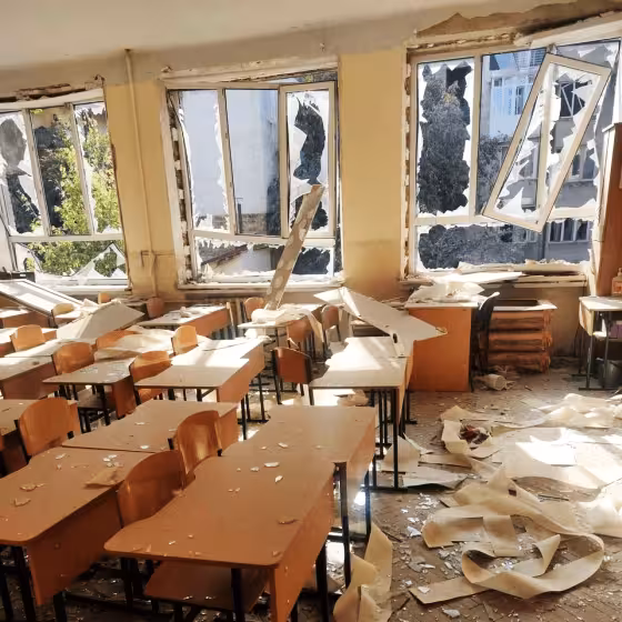 a ukrainian school classroom in lviv damaged by russian shelling